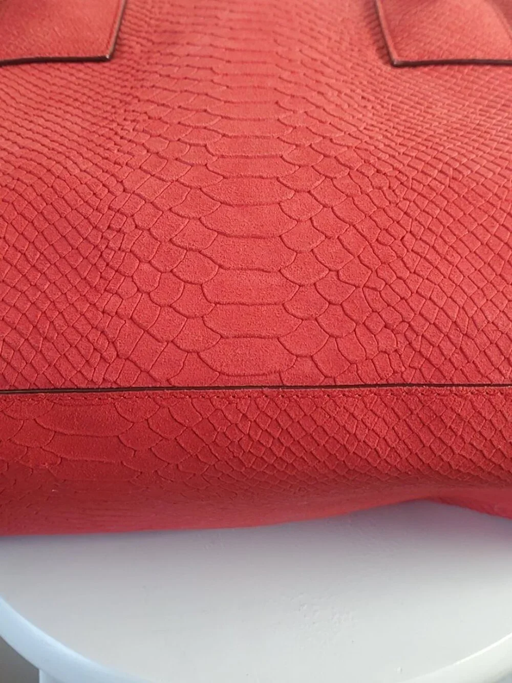19. Kate Spade New York Red Embossed Suede Large Top Handle Bag